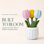 A 3D-printed tulip planter featuring three knitted tulips in pink, yellow, and light blue, planted in a white textured pot. The image includes promotional text on the left reading '3D-PRINTED TULIP PLANTER', 'BUILT TO BLOOM', and 'Layered with care.