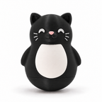 A black cat-shaped container or toy with a white belly, pink nose, and white whiskers, photographed on a clean white background.