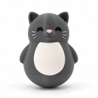 A dark gray cat-shaped squishy toy with a white belly, pink nose, and black eyes, shown on a clean white background.