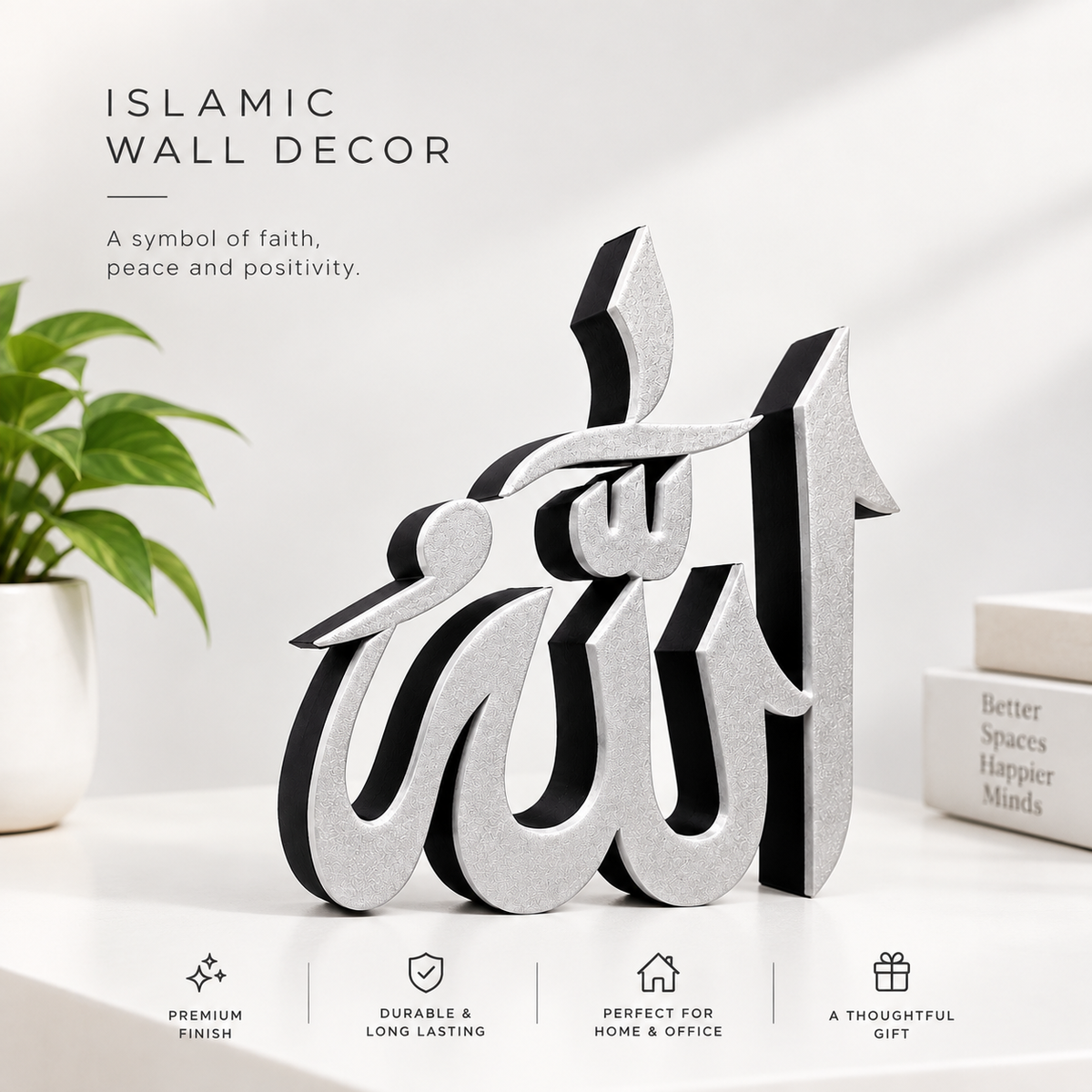 3D Islamic wall decor featuring the Arabic letter 'Amm' (الAن) in a modern stylized 3D font. The product has a brushed silver metallic finish with black shadows, displayed on a white surface next to a small potted plant and a book, with promotional text overlays.