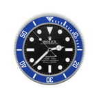 A Rolex Submariner watch dial and bezel combination, featuring a black dial with white hour markers and hands, and a vibrant blue rotating bezel with white markings.