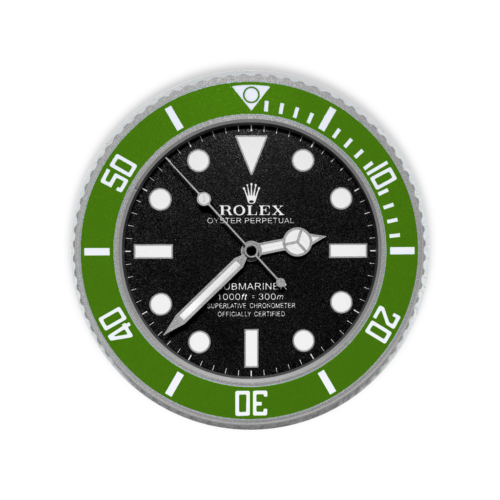 A circular wall clock styled like a Rolex Submariner watch, featuring a black dial, white hour markers and hands, and a bright green rotating bezel with white markings.