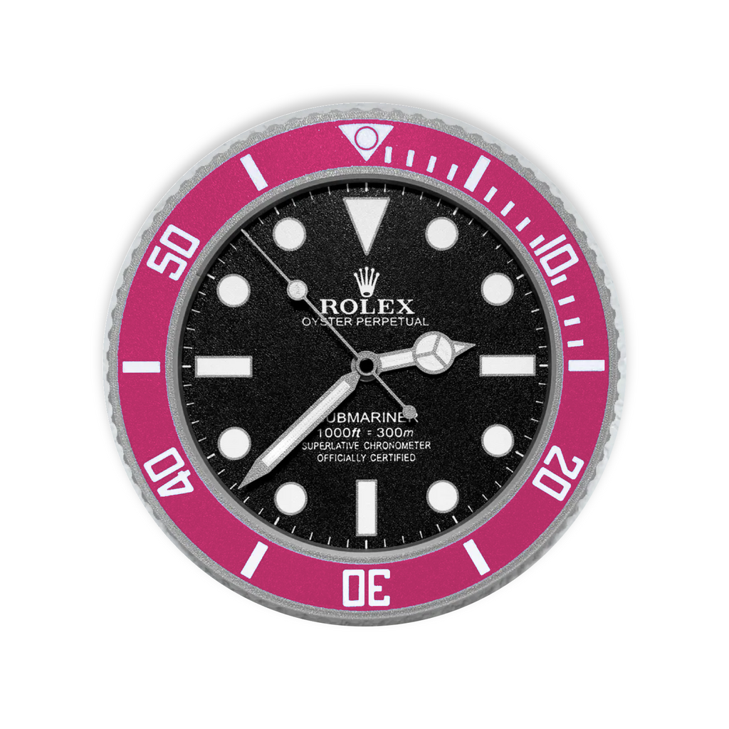 A Rolex Submariner watch dial and bezel combination, featuring a black dial with white markers and hands, and a vibrant pink rotating bezel with white markings.