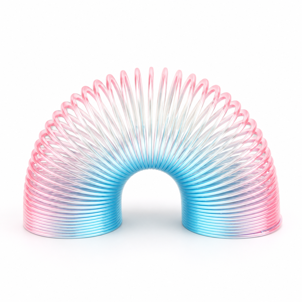 A translucent coiled elastic toy hose shaped like a rainbow arch, featuring a pink-to-blue gradient on a white background.