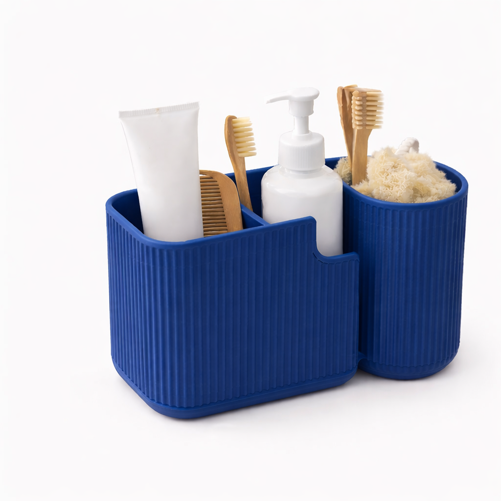 Blue bathroom caddy with toiletries including toothbrushes and bottles on a white background